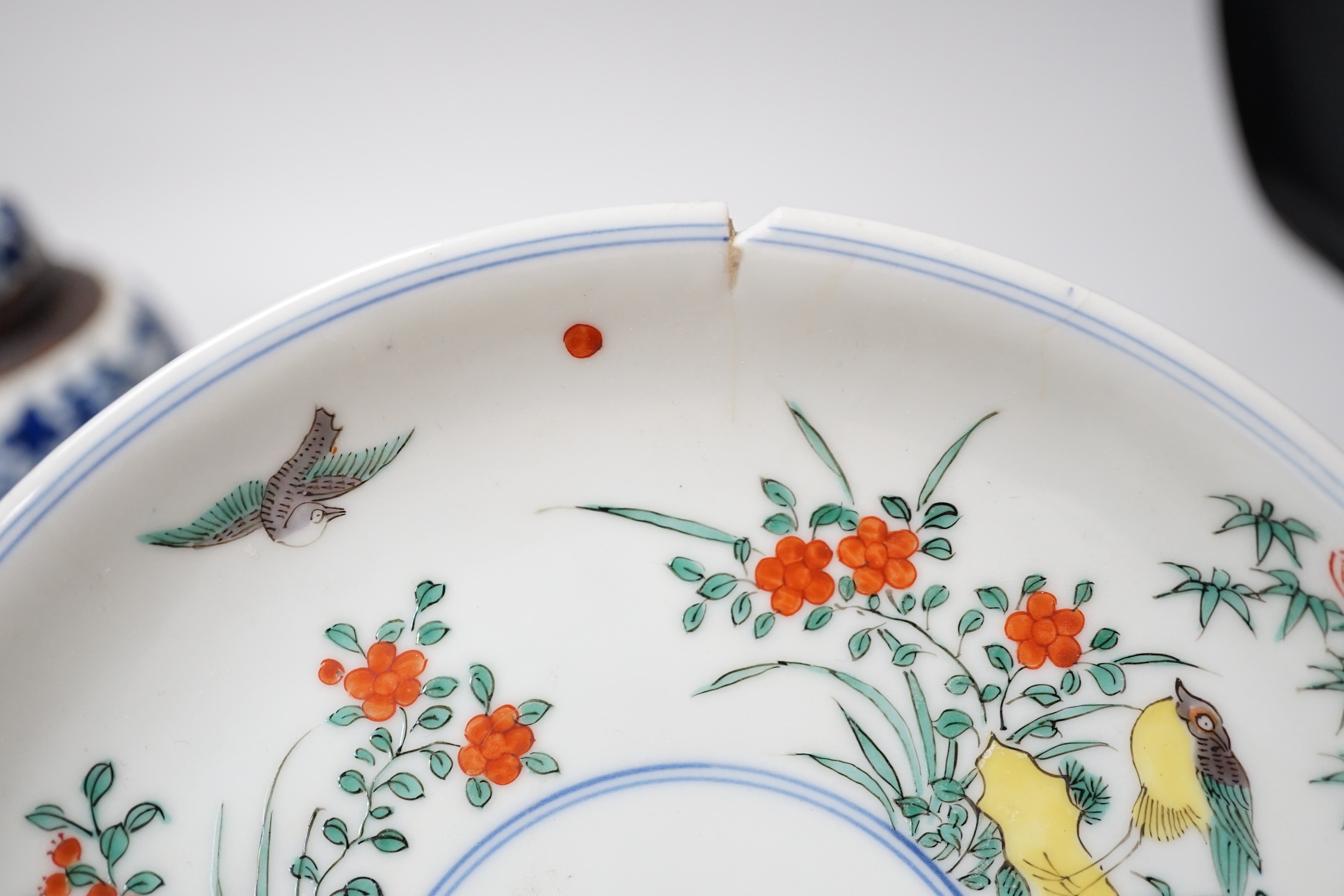 A Chinese famille rose plate, a cantonese plate and a blue and white crackle glaze jar